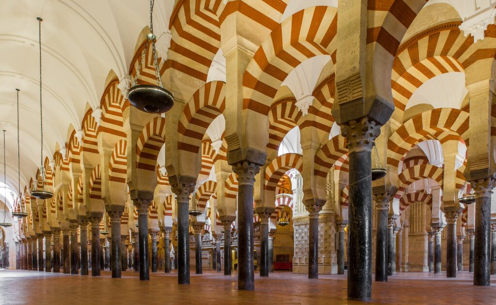 Mezquita-Cathedral Córdoba – Forest of Columns with Red and White Arches cordoba day trip from malaga - Mezquita Cathedral forest of columns with red and white arches